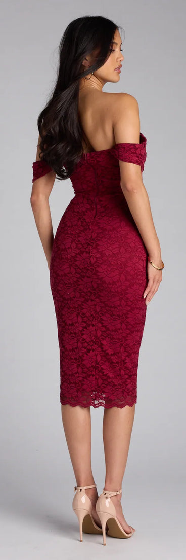 The Lavish And Lovely Bodycon Lace Midi Dress in burgundy features a flattering fit and mid-calf hem, redefining effortless midi dresses for any occasion.