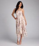 Soak up the season in the Blossomed Babe Floral Halter Midi Dress, a taupe sundress styled for easy days, outdoor plans, and everything in between.