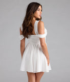 Shine with confidence, elegance, and standout style in the Flowy Chic Chiffon Cold-Shoulder Skater Dress—a white graduation dress designed with a fresh silhouette and the latest trends.