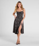 With its mid-calf hem and popular flattering fit, the Thriving Blooms Corset Floral Slit Midi Dress in black nails the balance of trend and ease, redefining go-to midi dresses for any occasion.