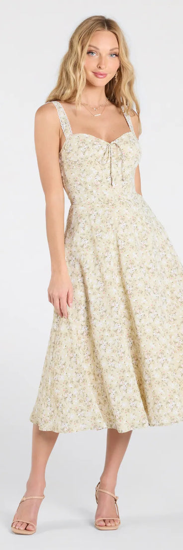 With its mid-calf hem and popular flattering fit, the Admired Cutie Floral A-Line Midi Dress in sage green nails the balance of trend and ease, redefining go-to midi dresses for any occasion.