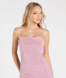 Make a bold statement in the Ignite The Charm Strapless Slit Midi Dress in mauve, the perfect spring dress for weddings, cocktail hours, nights out, and/or seasonal celebrations.