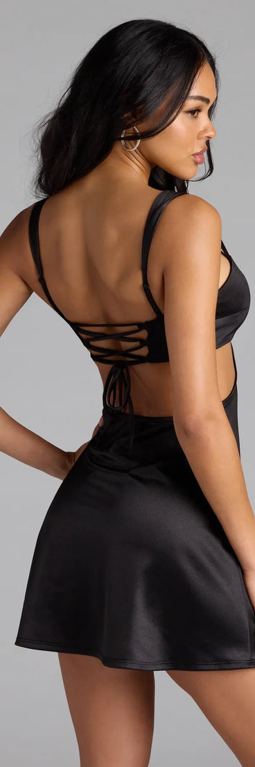 Step into the new season looking effortlessly chic in the Breathtaking View Lace Up A-Line Satin Mini Dress in black, a must-have Windsor dress for your cool-weather wardrobe.