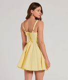 The Ray Of Beauty Lace-Up Corset Skater Dress in yellow brings sleek style to any graduation outfit, from cap and gown to after-party.