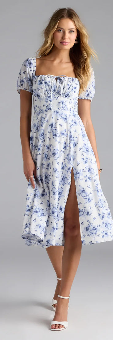 Soak up the season in the Charmingly Perfect Floral A-Line Midi Dress, a white sundress styled for easy days, outdoor plans, and everything in between.