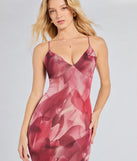 The Paradise Beauty Floral Mesh Maxi Dress is a flowy, plum maxi dress that moves with you from sunny days to elevated nights in effortless style.