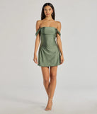 Make a bold statement in the Classics Lover Off-The-Shoulder Satin A-Line Mini Dress in sage green, the perfect green dress for weddings, cocktail hours, nights out, and/or seasonal celebrations.