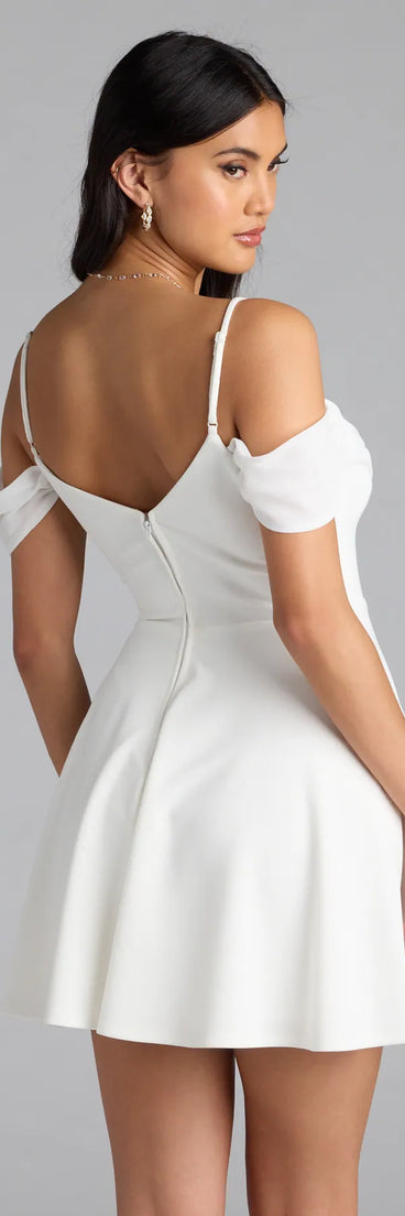 Shine with confidence, elegance, and standout style in the Sweet Touch Cold Shoulder Crepe Skater Dress—a ivory graduation dress designed with a fresh silhouette and the latest trends.