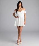 Shine with confidence, elegance, and standout style in the Sweet Touch Cold Shoulder Crepe Skater Dress—a ivory graduation dress designed with a fresh silhouette and the latest trends.