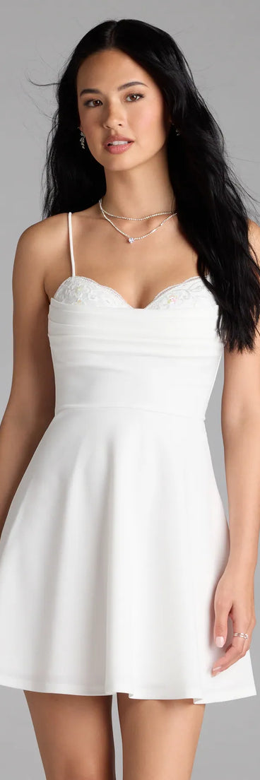 Shine with confidence, elegance, and standout style in the Sultry Glow Sequin Lace Trim Skater Dress—a white homecoming dress designed with a fresh silhouette and the latest trends.