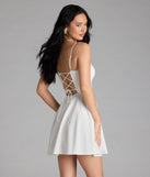 Shine with confidence, elegance, and standout style in the Sultry Glow Sequin Lace Trim Skater Dress—a white graduation dress designed with a fresh silhouette and the latest trends.
