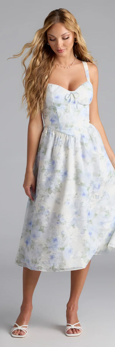 Step into summer looking effortlessly chic in the Charmed Sweetness Lace-Up Floral Chiffon Midi Dress in ivory, a must-have Windsor dress for your warm-weather wardrobe.