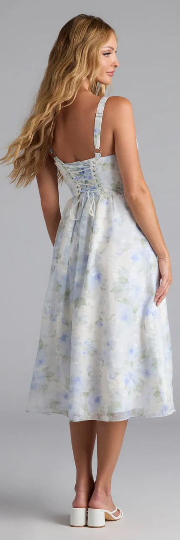 Soak up the season in the Charmed Sweetness Lace-Up Floral Chiffon Midi Dress, a ivory sundress styled for easy days, outdoor plans, and everything in between.