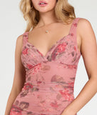 Make a bold statement in the Romantic Charm V-Neck Floral Midi Dress in mauve, the perfect summer dress for weddings, cocktail hours, nights out, and/or seasonal celebrations.