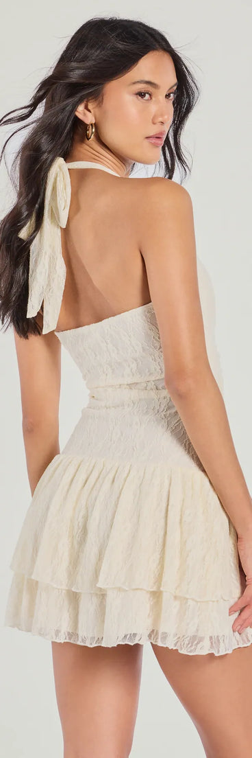 Flirtatious Scene Halter Lace Skater Dress, a trendy ivory mini dress featuring modern details and a fresh seasonal hue, perfect for creating chic 2025 looks.