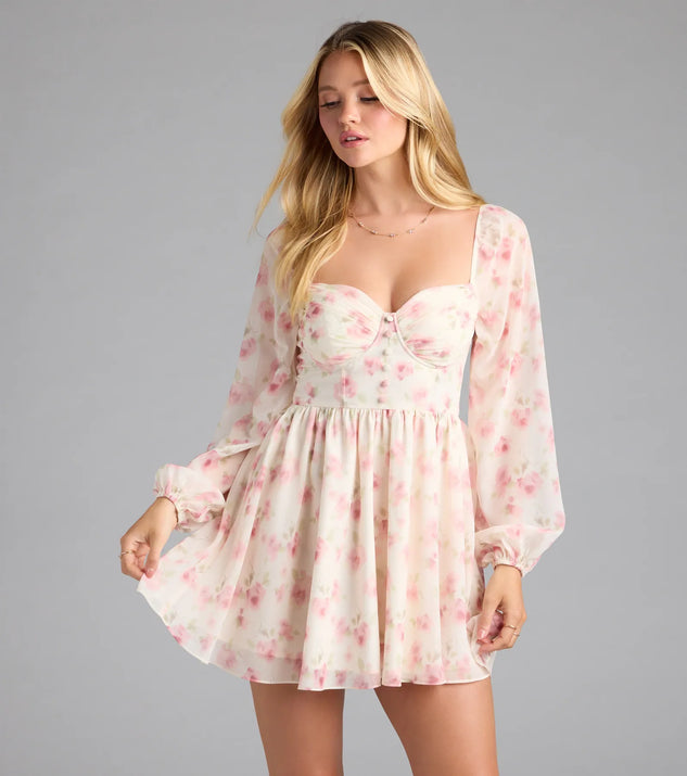 Step into summer looking effortlessly chic in the Elevated Outing Floral Long Sleeve Chiffon Skater Dress in ivory, a must-have Windsor dress for your warm-weather wardrobe.
