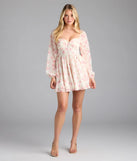 Step into summer looking effortlessly chic in the Elevated Outing Floral Long Sleeve Chiffon Skater Dress in ivory, a must-have Windsor dress for your warm-weather wardrobe.