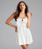 Shine with confidence, elegance, and standout style in the Flirty Girlie Lace-Up A-Line Mini Dress—a ivory graduation dress designed with a fresh silhouette and the latest trends.