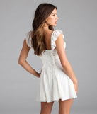 Shine with confidence, elegance, and standout style in the Flirty Girlie Lace-Up A-Line Mini Dress—a ivory graduation dress designed with a fresh silhouette and the latest trends.