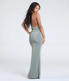 The True Showstopper Open Back Bodycon Maxi Dress is a flowy, sage green maxi dress that moves with you from sunny days to elevated nights in effortless style.