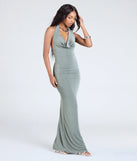 Make a bold statement in the True Showstopper Open Back Bodycon Maxi Dress in sage green, the perfect green dress for weddings, cocktail hours, nights out, and/or seasonal celebrations.