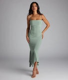 Feel instantly put-together in the Stunning Silhouette Bodycon Midi Dress in sage green, a summer wedding guest dress designed for confident style and all-out celebration.