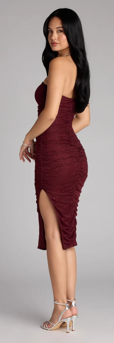The Shimmering Allure Glitter Tube Midi Dress in wine features a flattering fit and mid-calf hem, redefining effortless midi dresses for any occasion.
