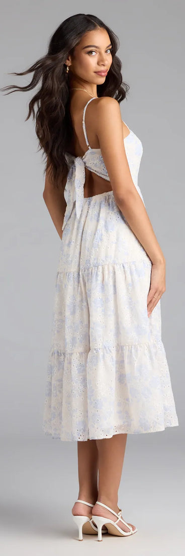 The My Cute Side Tie-Back Floral Eyelet Midi Dress in white features a flattering fit and mid-calf hem, redefining effortless midi dresses for any occasion.