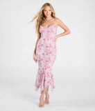 With its mid-calf hem and popular flattering fit, the Bloom With A View Floral Ruffle Midi Dress in mauve nails the balance of trend and ease, redefining go-to midi dresses for any occasion.