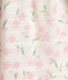 Soak up the season in the Floral Charm Ruffled Chiffon Tube Skater Dress, a white sundress styled for easy days, outdoor plans, and everything in between.