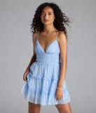 Feel confident and photo-ready in the Subtle Grace V-Neck Polka Dot Chiffon Skater Dress, a light blue graduation dress perfect for 2025 ceremonies and parties.