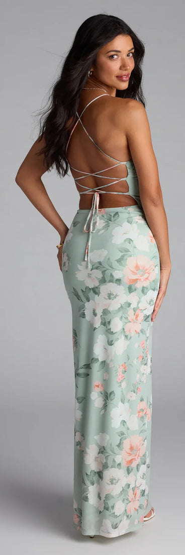 Soak up the season in the Laced-Up Masterpiece Floral Slit Maxi Dress, a sage green sundress styled for easy days, outdoor plans, and everything in between.