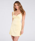 Make a bold statement in the Always A Celebration Tie-Back Satin A-Line Mini Dress in yellow, the perfect spring dress for weddings, cocktail hours, nights out, and/or seasonal celebrations.