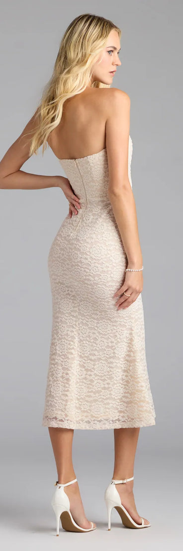 The Romantic Twist Corset Mermaid Midi Dress in ivory features a flattering fit and mid-calf hem, redefining effortless midi dresses for any occasion.