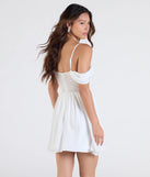 Make a bold statement in the Sheer Fave Chiffon Cold-Shoulder Corset Skater Dress in off-white, the perfect spring dress for weddings, cocktail hours, nights out, and/or seasonal celebrations.