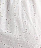 Shine with confidence, elegance, and standout style in the Effortless Eyelet Bubble Hem Mini Dress—a white graduation dress designed with a fresh silhouette and the latest trends.