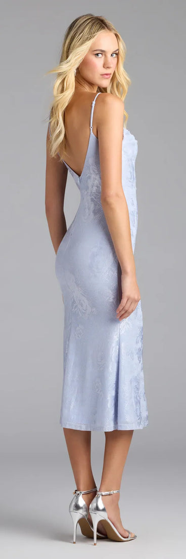 The Chic Masterpiece Low Back Lace Midi Dress in light blue features a flattering fit and mid-calf hem, redefining effortless midi dresses for any occasion.