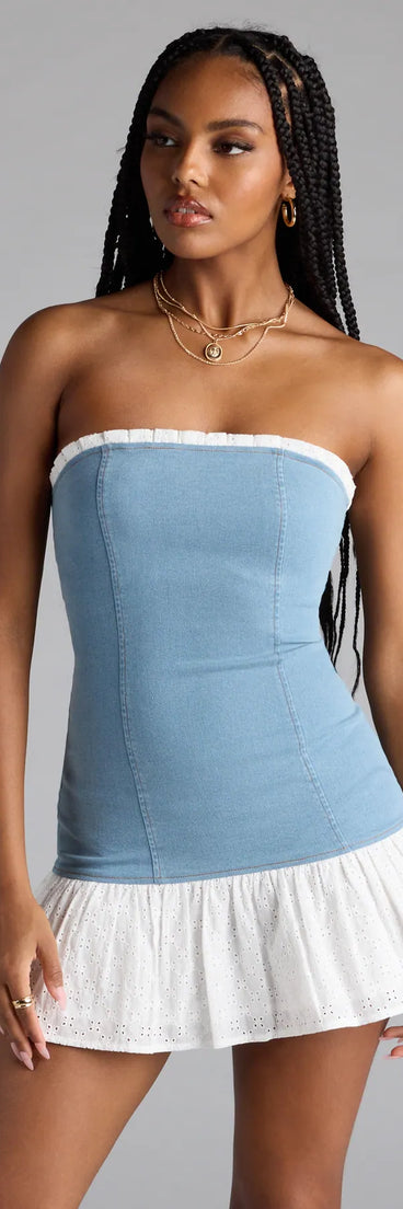 Step into summer looking effortlessly chic in the Cutesy Flair Ruffled Denim Mini Dress in denim blue, a must-have Windsor dress for your warm-weather wardrobe.