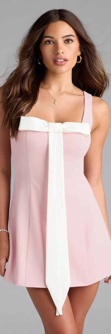 Bring a fun and feminine vibe with the Cutest Icon Bow A-Line Mini Dress, a scroll-stopping style from Windsor's pink homecoming dress collection that brings playful charm to every HOCO moment.