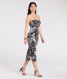 With its mid-calf hem and popular flattering fit, the Tropical Mood Strapless Midi Dress in taupe nails the balance of trend and ease, redefining go-to midi dresses for any occasion.