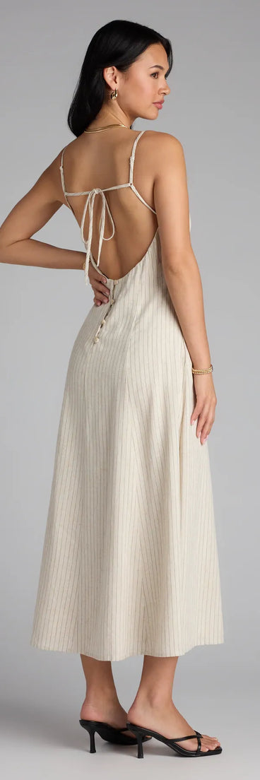 The Chic Twist Tie-Back Striped Midi Dress in ivory features a flattering fit and mid-calf hem, redefining effortless midi dresses for any occasion.