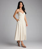 The Chic Twist Tie-Back Striped Midi Dress in ivory features a flattering fit and mid-calf hem, redefining effortless midi dresses for any occasion.