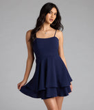 Shine with confidence, elegance, and standout style in the Lovely Day Tie Back Ruffle Skater Dress—a navy blue graduation dress designed with a fresh silhouette and the latest trends.
