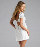 Shine with confidence, elegance, and standout style in the Definitely Darling Tie Back Babydoll Mini Dress—a white graduation dress designed with a fresh silhouette and the latest trends.