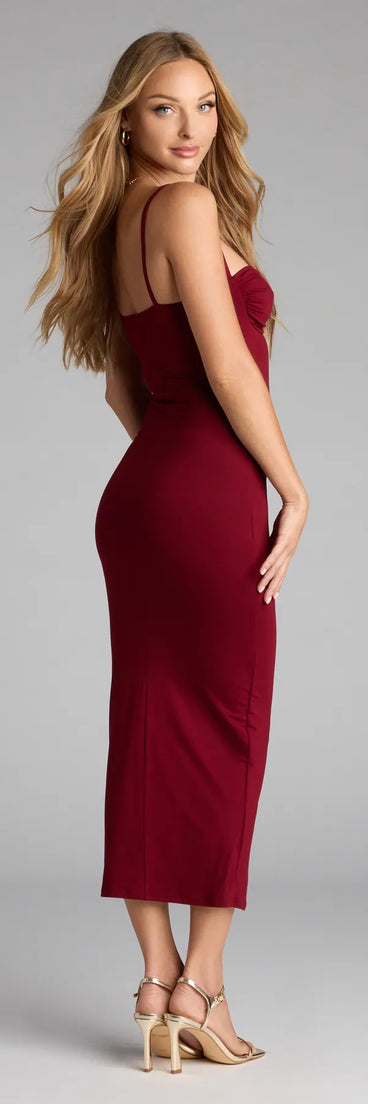 The Heartbreaker Hourglass Midi Dress in wine features a flattering fit and mid-calf hem, redefining effortless midi dresses for any occasion.