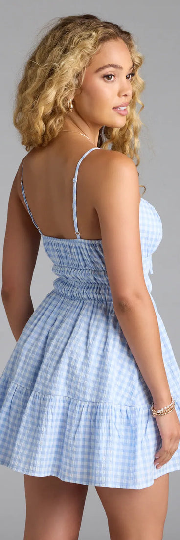 Soak up the season in the Cheerful Cutie Gingham Skater Dress, a light blue sundress styled for easy days, outdoor plans, and everything in between.