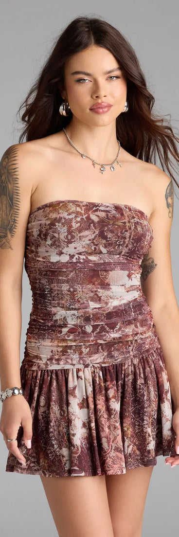 Step into the new season looking effortlessly chic in the Forever Dreaming Strapless Cutout Ruffle Mini Dress in brown, a must-have Windsor dress for your cool-weather wardrobe.