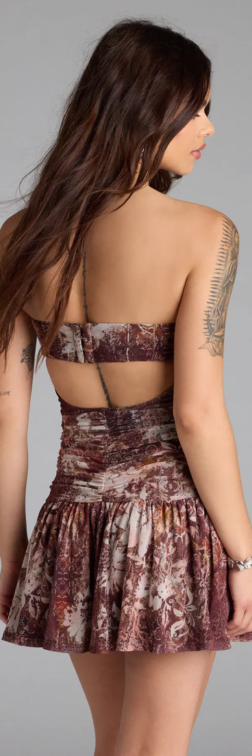 Soak up the season in the Forever Dreaming Strapless Cutout Ruffle Mini Dress, a brown sundress styled for easy days, outdoor plans, and everything in between.