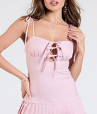 Make a bold statement in the Simply Cute Tie Front Pleated Mini Dress in pink, the perfect spring dress for weddings, cocktail hours, nights out, and/or seasonal celebrations.