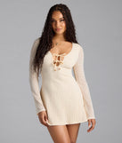 Soak up the season in the Dreamy Boho Bell Sleeve Knit Mini Dress, a ivory sundress styled for easy days, outdoor plans, and everything in between.